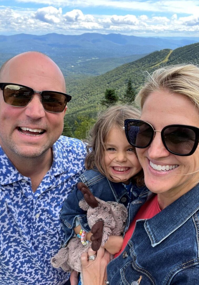 Family selfie on scenic mountain overlook